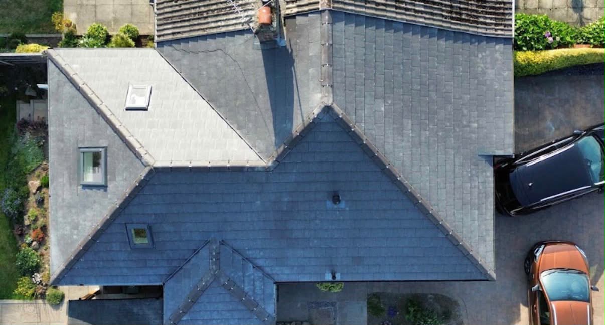 Overhead view of a finished hip roof with roof windows